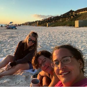 Stefanie Halbert with friends at the beach.